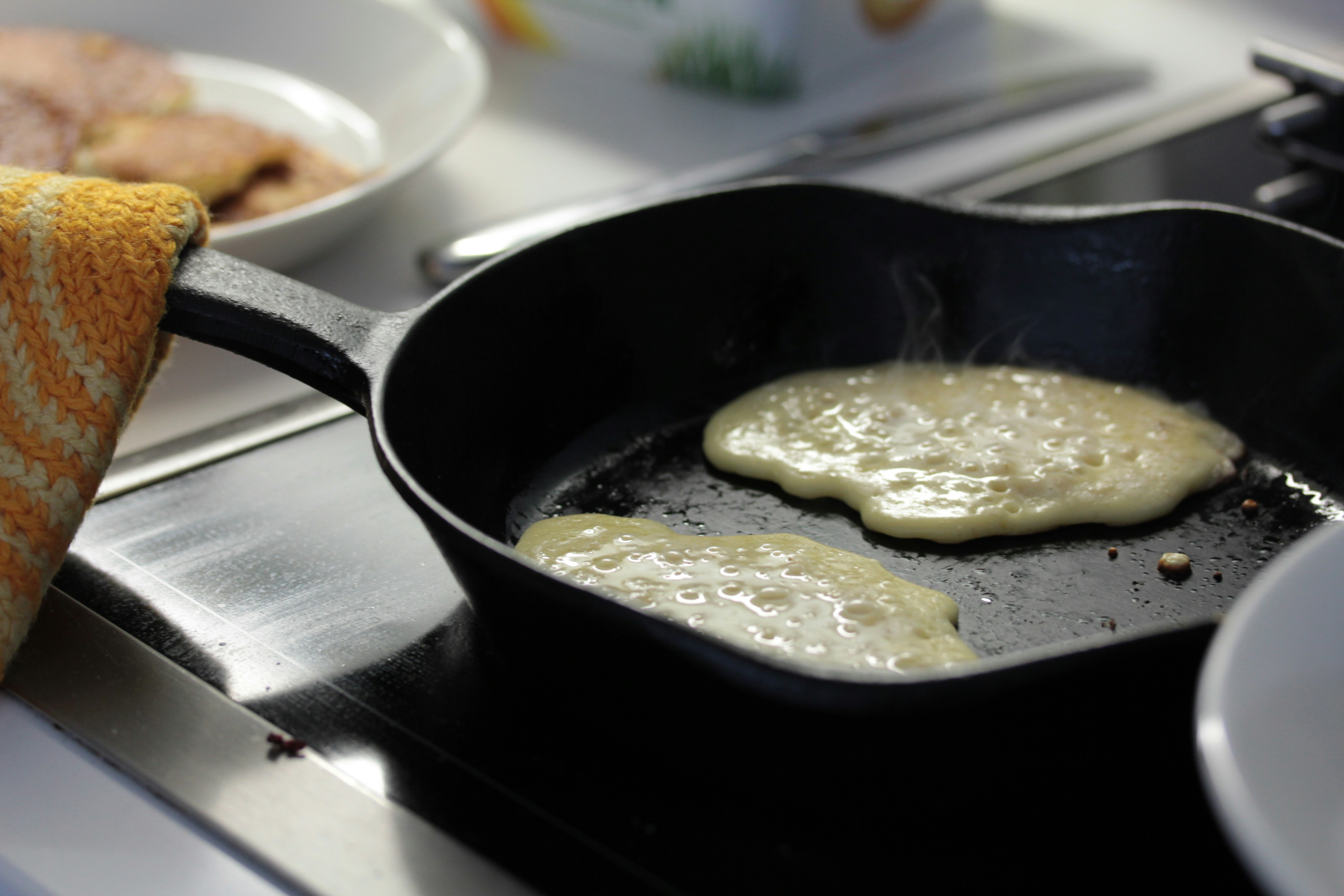 A cast iron pan, close-up, natural light