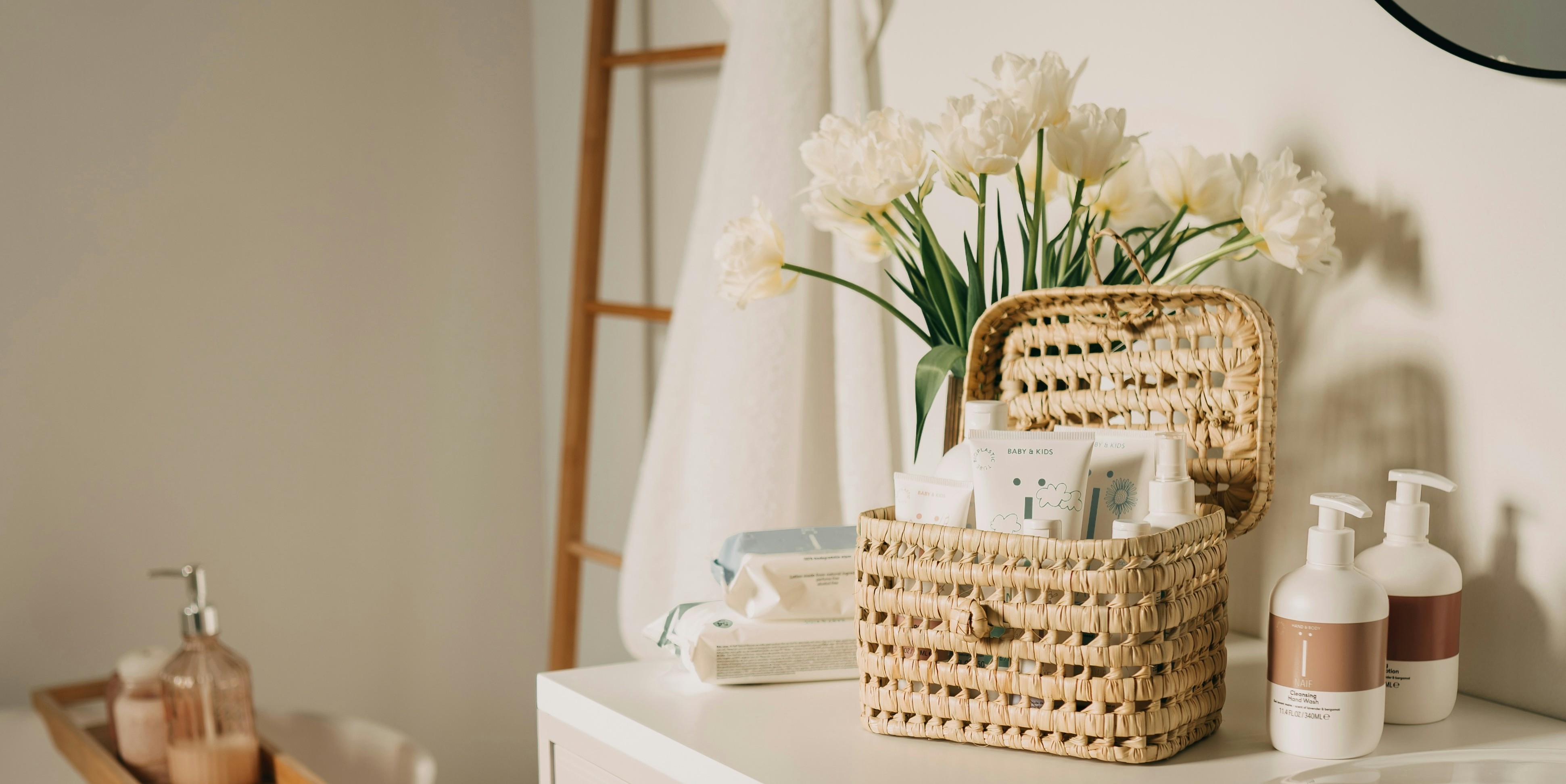 A bathroom shelf with a mix of conventional and natural personal care products, real and unposed, natural light