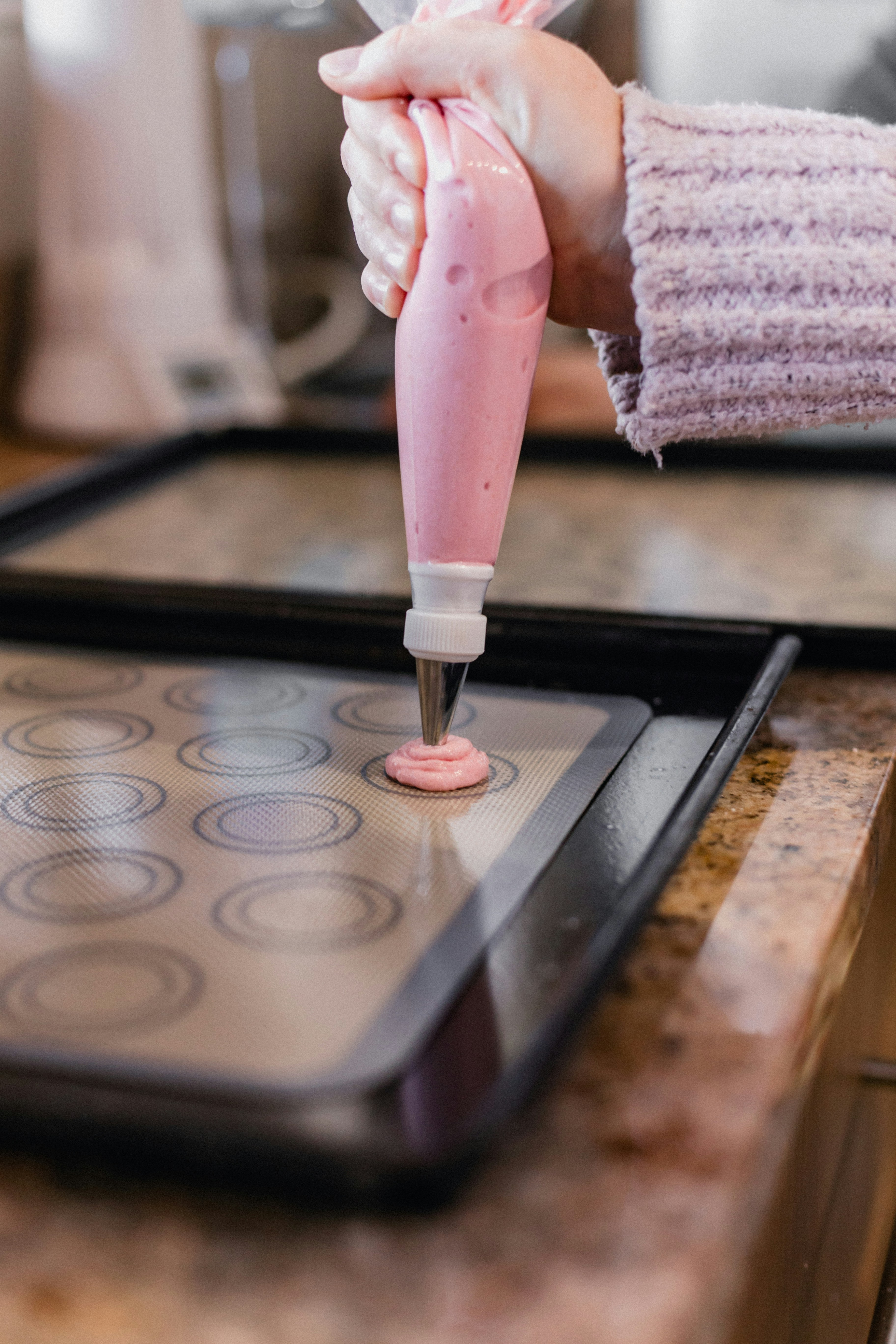 Glass containers, silicone bags and beeswax wraps arranged as alternatives to plastic, overhead, natural light